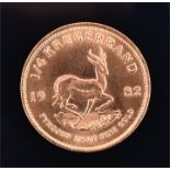 A 1/4 Krugerrand coin 1982, 8.6 grams.