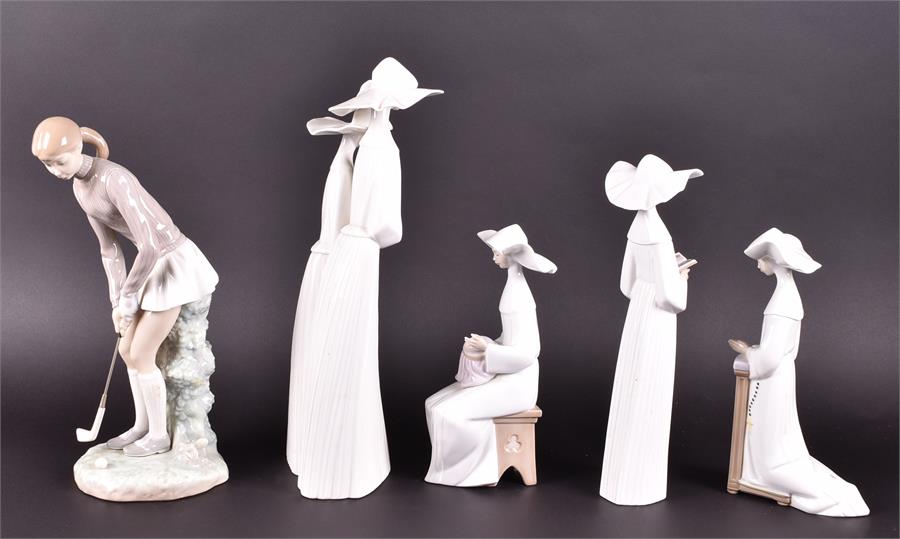 A collection of five Lladro figures to include four nuns and a female golfer, all boxed - Bild 2 aus 2