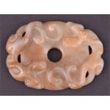 A Chinese mutton fat jade Bi (or Pi) disk double-sided, each centred with ringed disc and hole,