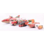 A small collection of tin plate toys to include an express train and carriage, a moon rocket, a