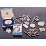 A quantity of silver and white metal items to include an American dollar coin pendant, three further