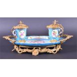 A 19th century French Sevres porcelain and ormolu mounted standish in the bleu celeste palette, an