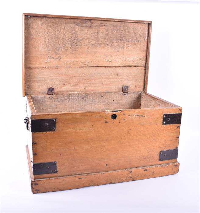 A small Victorian pine trunk with wrought iron handles and metal strap work. 61 cm wide. - Image 2 of 9