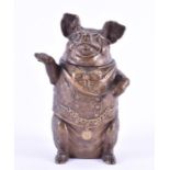 A late 19th/early 20th century novelty lidded tobacco jar in the form of a smartly dressed pig in