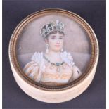A 19th century portrait miniature painted on ivory set into an ivory box depicting a young