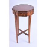 A small Edwardian Sheraton Revival occasional table/night stand  the octagonal top supported on four