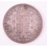 An 1844 Queen Victoria silver crown with young head and shield verso, with engraved rim.