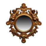 A cast metal framed mirror the open-work bronze-painted frame decorated with two cherubs and the
