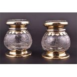 A pair of Victorian silver gilt mounted scent bottles  London 1899, maker's mark T.W, each moulded