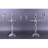 A pair of silver candelabra Sheffield 1968, by James Dixon & Sons Ltd, each central knopped column