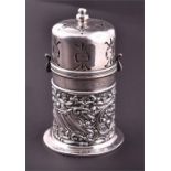 An Edwardian silver sugar caster Birmingham 1901, by Mappin & Webb, of cylindrical form, embossed