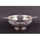 A large George V silver bowl Sheffield 1922, by Sibray, Hall & Co Ltd, of stylised quaiche form,