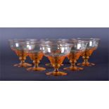 A set of six Stuart amber glass sundae dishes with ribbed decoration, c.1921. 9 cm high. CONDITION