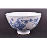 A fine Chinese blue and white porcelain bowl decorated with ornate floral patterns centred with