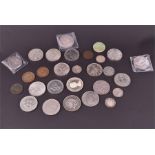 A collection of assorted coinage including three Victoria crowns, a George III crown and other