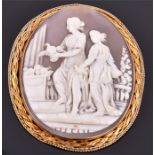 A 9ct yellow gold mounted cameo brooch of oval form, depicting two Classical maidens holding