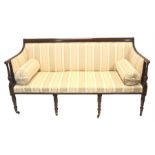 A good quality Regency upholstered mahogany framed sofa the fluted frame with turned arms and