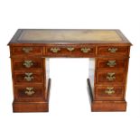 A good quality reproduction cross-banded mahogany and burr veneered pedestal desk with one long