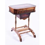 A 19th century work box the canted rectangular top in mixed veneers revealing a fitted interior,