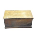 A Victorian pine blanket box of simple form, the top opening to reveal candle tray, 81 cm wide.