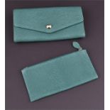 A Mulberry wallet in green leather, with green leather and brown fabric lining, unused, length
