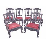 A fine suite of six 19th century Anglo-Indian colonial carved hardwood chairs two carvers and four