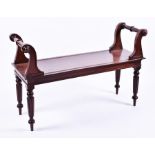 A William IV mahogany hall / window seat with scrolled end supports and turned handles, solid seat