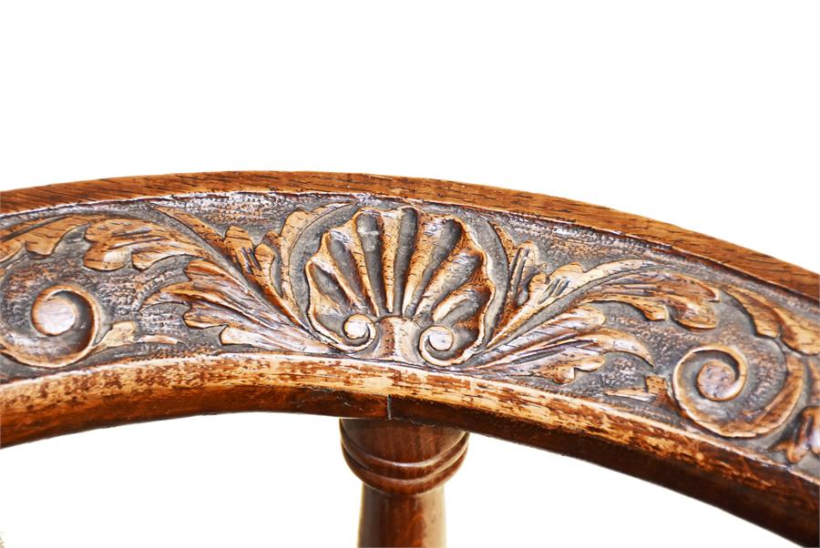 A Victorian carved oak corner chair the frame carved with scrolling acanthus and scalloped - Image 2 of 2
