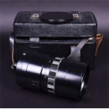 A large 20th century cased Russian-made photographic mirror lens with a constant aperture Maksutov