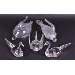 A selection of clear moulded Victorian glass models of swans  together with two Venetian glass oil
