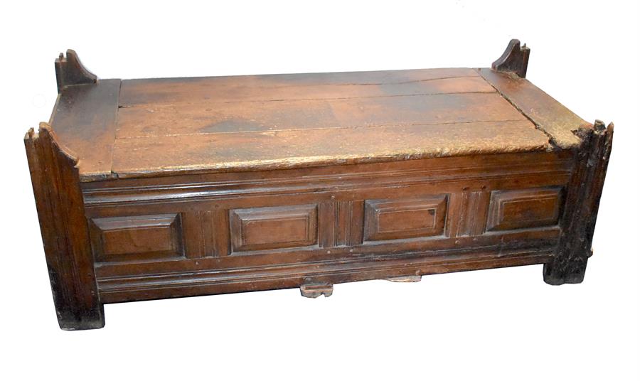 An unusual 18th century or earlier rustic provincial French oak chest with planked top, panelled