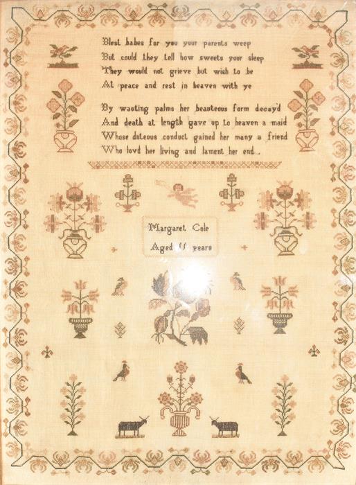 A late 19th / early 20th century embroidered cross stitched sampler with a two verse poem by '