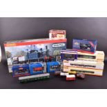 A large collection of mostly Hornby 00 gauge model trains and accessories with other makes including