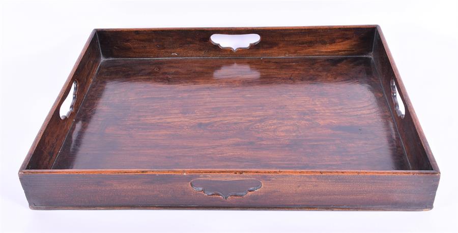 A 19th century mahogany butler's tray with pierced grip handles and brass-banded sides, 70 cm long, - Image 3 of 4