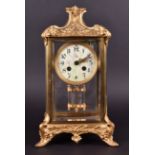 A 19th century gilded four glass mantel clock the cream enamel dial painted with flowers and