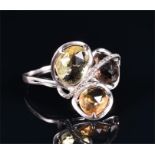 An unusual 9ct white gold, diamond, and faceted quartz ring set with a smokey quartz, a lemon