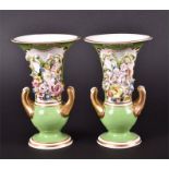 A pair of early 19th century Derby porcelain encrusted vases decorated with bouquets of applied