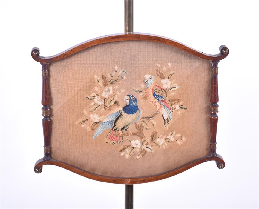 A William IV Regency pole screen the needlework panel embroidered with a scene of parrots, with - Image 2 of 8