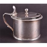 A Georgian silver mustard pot indistinct London hallmark, makers mark 'W S', of circular form with