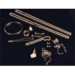 A quantity of yellow gold items to include two 9ct gold rope-twist necklaces, a 9ct rope twist