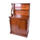 A Regency mahogany chiffoniere in the Egyptian taste the top with brass gallery scrolled sides,