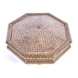 A good quality early 20th century Syrian / Ottoman lacquered lidded box of octagonal form, decorated