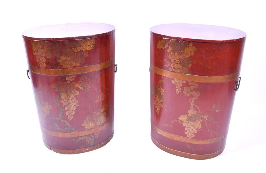 A pair of 20th century Chinese red lacquer chinoiserie barrels decorated all over with gilt