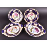 A pair of late 19th century porcelain dessert dishes with a cobalt blue border, with gilt heightened