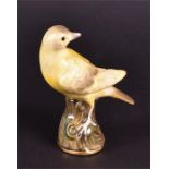 A small Meissen yellow canary marked to base, 10 cm high.