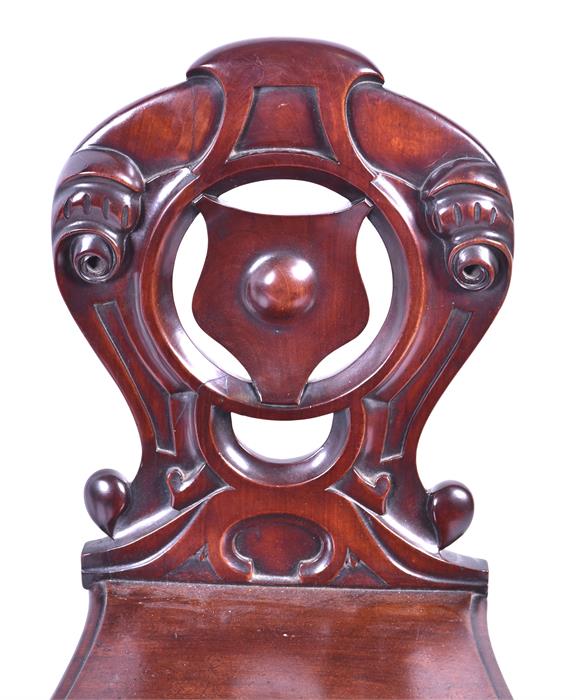 A pair of early 20th century dark wood shield back hall chairs with carved cartouche, turned back - Image 2 of 2