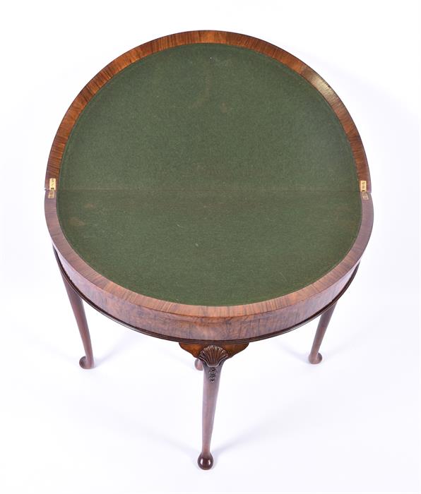A Queen Anne style demi-lune walnut card table with cabriole legs, 81.5 cm diameter, 73.5 cm high. - Image 2 of 4