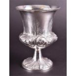 A Victorian silver goblet London 1842, by William Hunter, with engraved and repousse floral