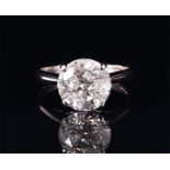 An 18ct white gold and solitaire diamond ring the round brilliant cut diamond of approximately 4.0