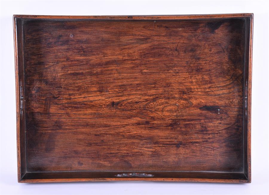 A 19th century mahogany butler's tray with pierced grip handles and brass-banded sides, 70 cm long, - Image 2 of 4